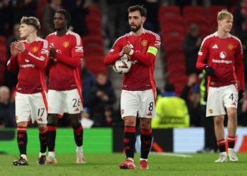 Ruben Amorim telah menyiapkan mantan muridnya sebagai pengganti Bruno Fernandes (tengah) di Manchester United. (DARREN STAPLES / AFP)