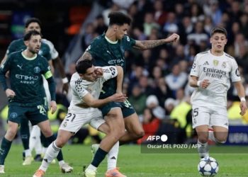Manchester City berhasil melakoni kemenangan comeback atas Real Madrid di Santiago Bernabeu. (OSCAR DEL POZO / AFP)